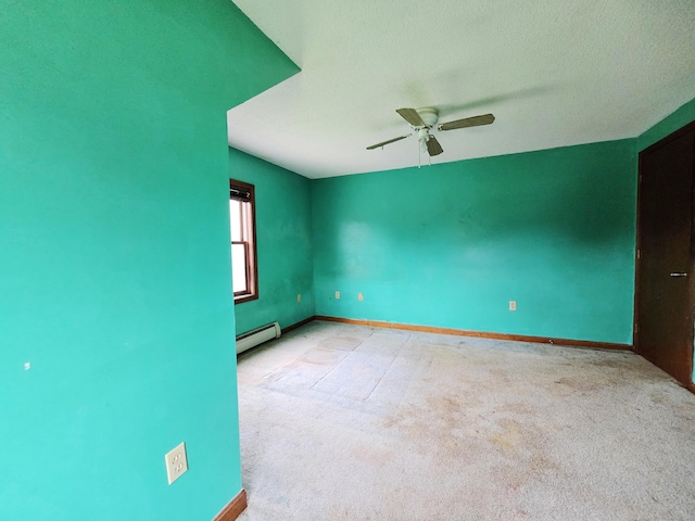 947 Ekonk Hill Rd, Voluntown, CT 06384 - empty room with baseboard heating, light colored carpet, and a ceiling fan