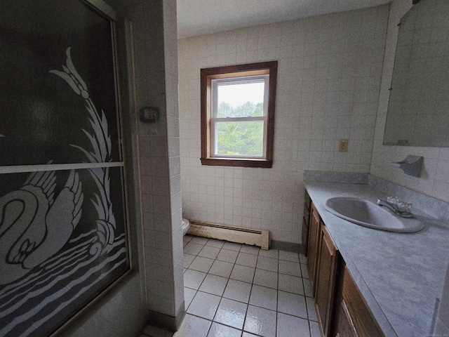 947 Ekonk Hill Rd, Voluntown, CT 06384 - bathroom with a baseboard radiator, vanity, tile patterned flooring, and tile walls