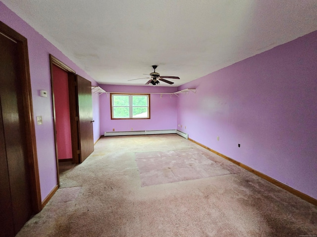 947 Ekonk Hill Rd, Voluntown, CT 06384 - spare room with baseboard heating, light colored carpet, and ceiling fan