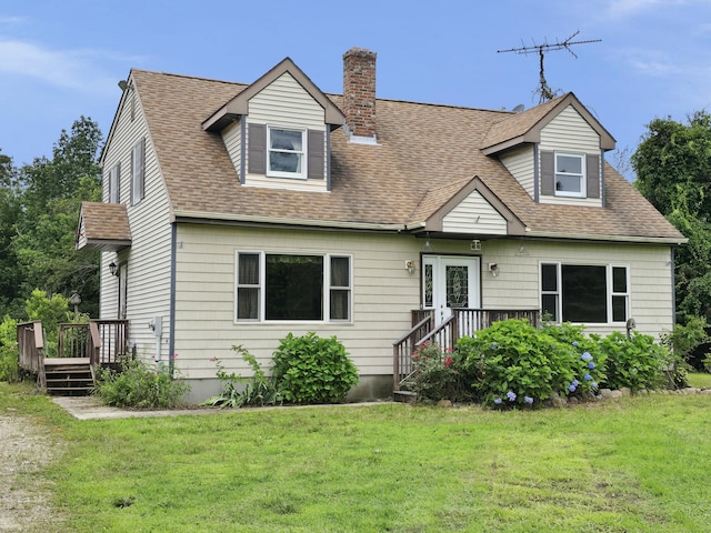 947 Ekonk Hill Rd, Voluntown, CT 06384 - new england style home with a chimney, a front lawn, a wooden deck, and a shingled roof