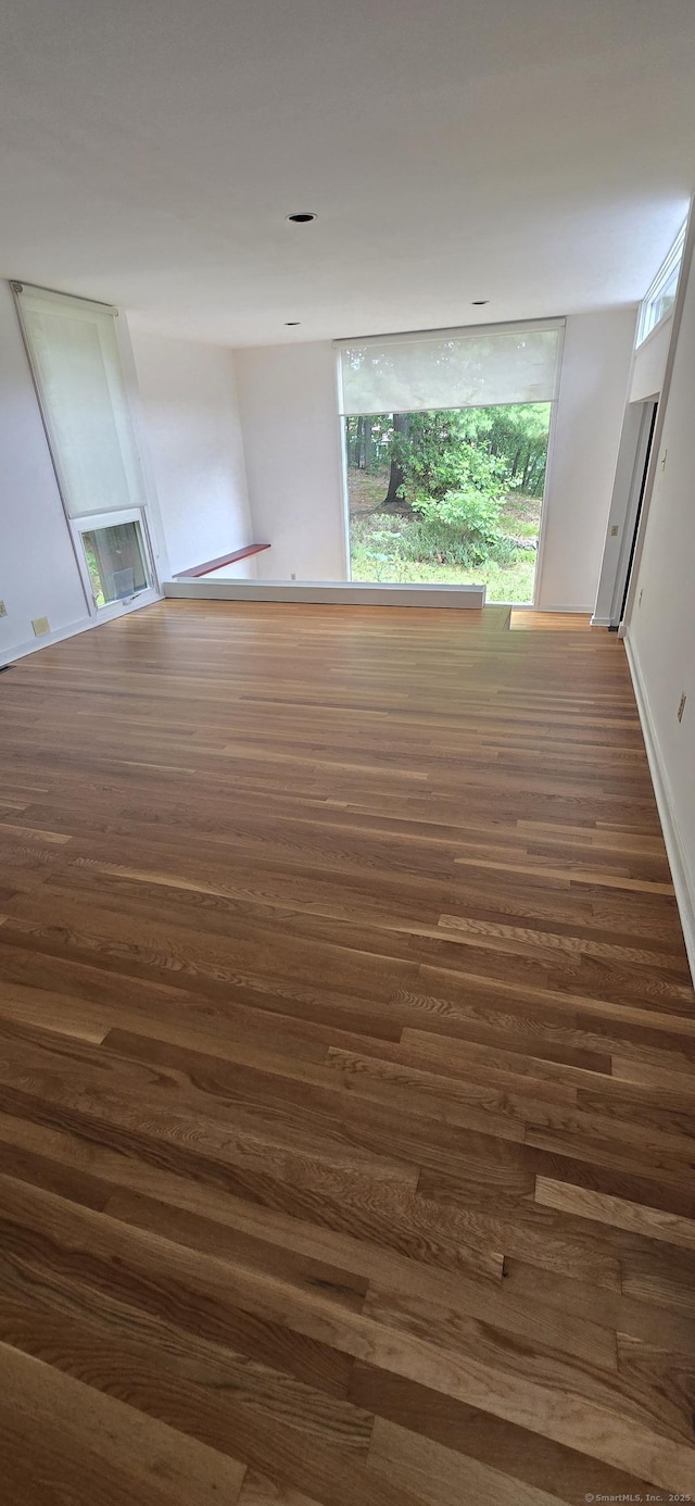 100 Mildred Ave, Waterbury, CT 06708 - spare room with dark wood-style floors and baseboards