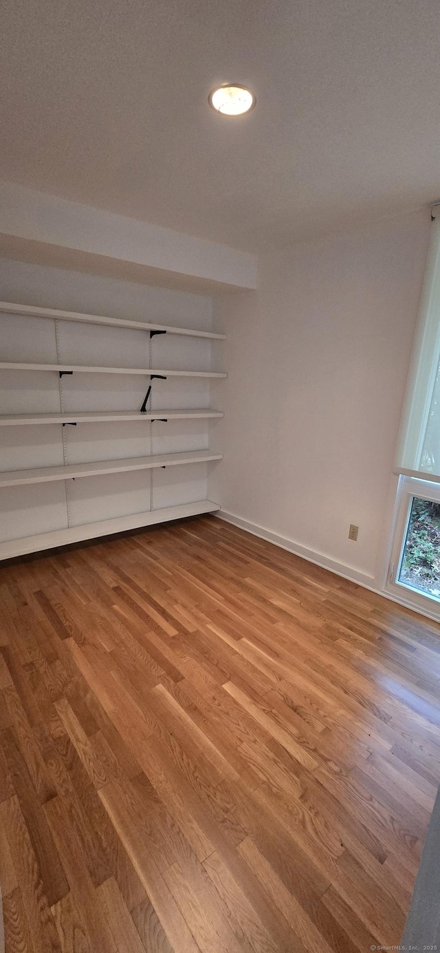 100 Mildred Ave, Waterbury, CT 06708 - unfurnished bedroom featuring wood finished floors and recessed lighting