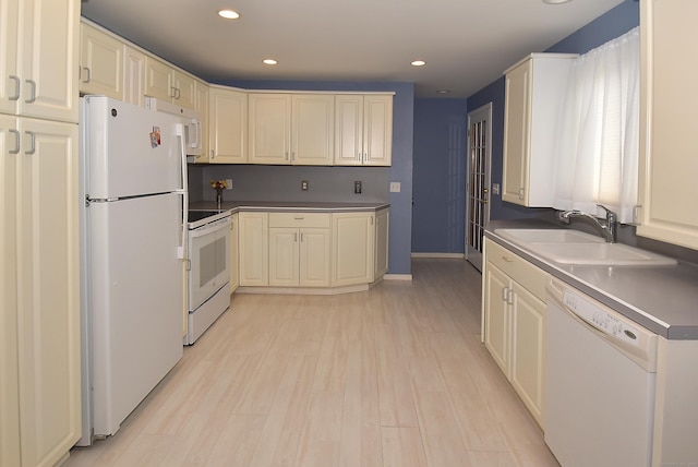 20 Tumble Brook Rd, Rocky Hill, CT 06067 - kitchen with white appliances, recessed lighting, light wood-type flooring, and dark countertops