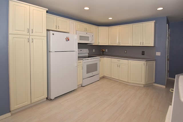 20 Tumble Brook Rd, Rocky Hill, CT 06067 - kitchen with white appliances, dark countertops, recessed lighting, and light wood-type flooring
