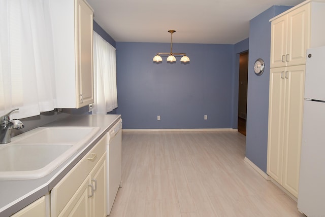 20 Tumble Brook Rd, Rocky Hill, CT 06067 - kitchen with white appliances, a chandelier, light wood-type flooring, pendant lighting, and white cabinets