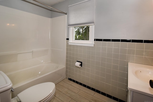 20 Tumble Brook Rd, Rocky Hill, CT 06067 - bathroom with tile walls, vanity, and bathing tub / shower combination