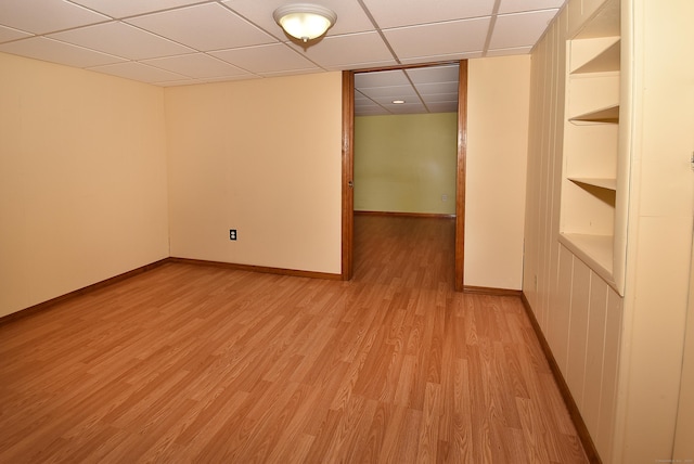 20 Tumble Brook Rd, Rocky Hill, CT 06067 - empty room featuring light wood-type flooring, a drop ceiling, and built in shelves