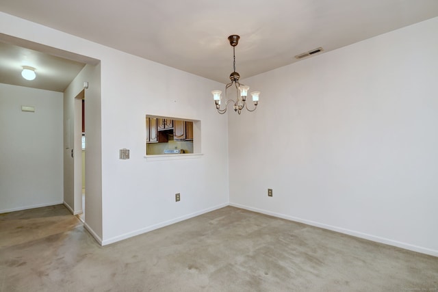 25 Janet Cir Unit F, Bridgeport, CT 06606 - unfurnished room featuring a chandelier and light carpet