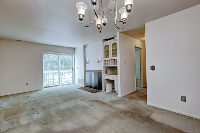 25 Janet Cir Unit F, Bridgeport, CT 06606 - unfurnished living room with a chandelier and carpet floors