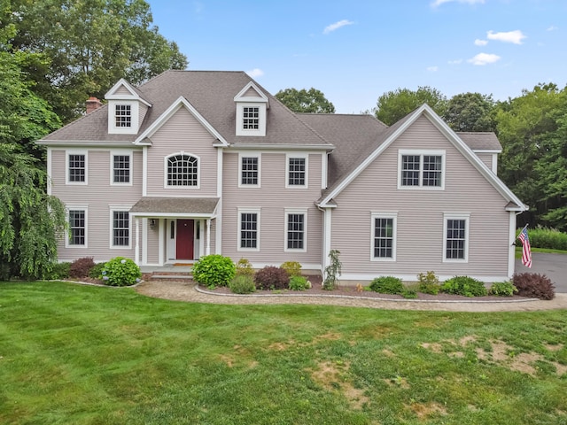 36 Blueberry Ln, Canton, CT 06019 - colonial home with a front yard and roof with shingles