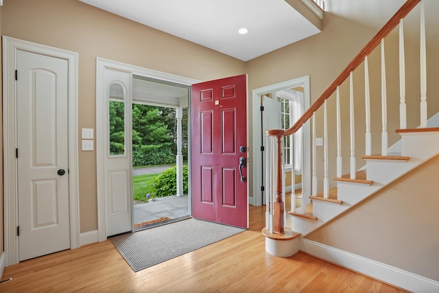 36 Blueberry Ln, Canton, CT 06019 - entrance foyer featuring wood finished floors and stairs