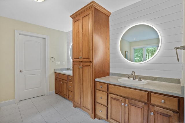 36 Blueberry Ln, Canton, CT 06019 - full bath with two vanities and tile patterned floors