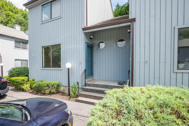19 Somers St Unit D1, Danbury, CT 06810 - view of exterior entry featuring board and batten siding