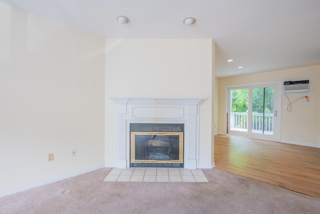 19 Somers St Unit D1, Danbury, CT 06810 - detailed view of a wall mounted air conditioner, carpet flooring, a fireplace with flush hearth, and recessed lighting