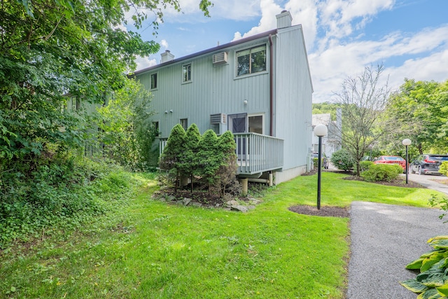 19 Somers St Unit D1, Danbury, CT 06810 - view of side of home with a chimney and a lawn