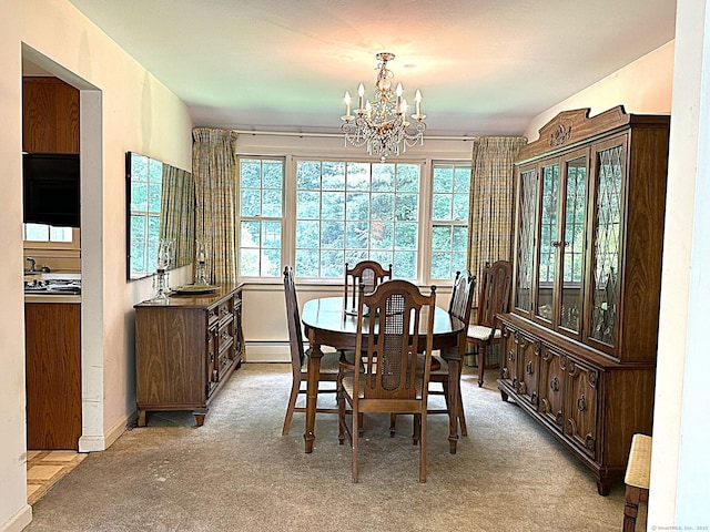 51 Westridge Dr, Avon, CT 06001 - dining area with carpet, a chandelier, and a baseboard heating unit