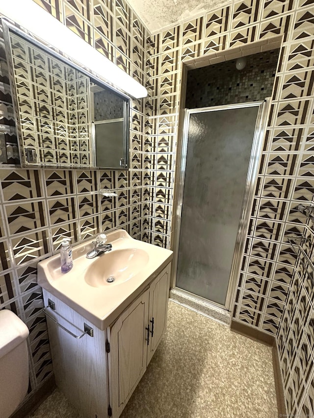 51 Westridge Dr, Avon, CT 06001 - bathroom with a stall shower, vanity, and tile walls