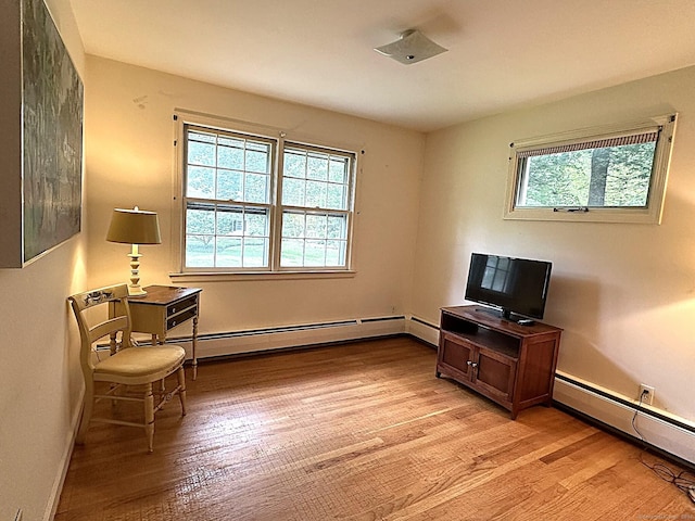 51 Westridge Dr, Avon, CT 06001 - living area featuring a baseboard radiator and light wood-style floors