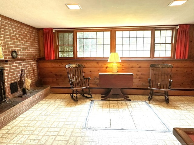 51 Westridge Dr, Avon, CT 06001 - sitting room with brick patterned flooring and a fireplace