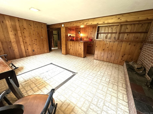 51 Westridge Dr, Avon, CT 06001 - unfurnished living room with wooden walls and brick patterned flooring