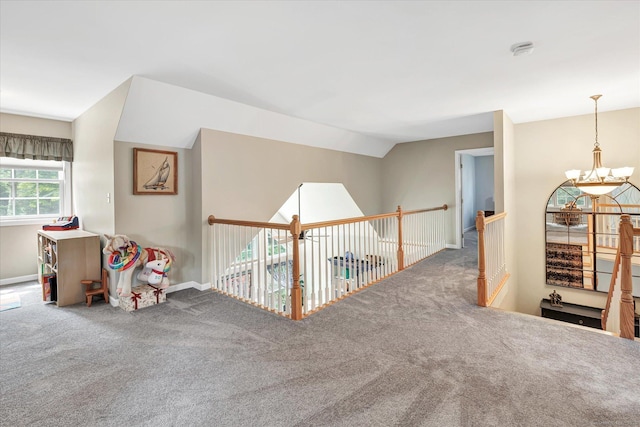24 Windflower Ln, Shelton, CT 06484 - hallway featuring carpet flooring, a chandelier, and an upstairs landing