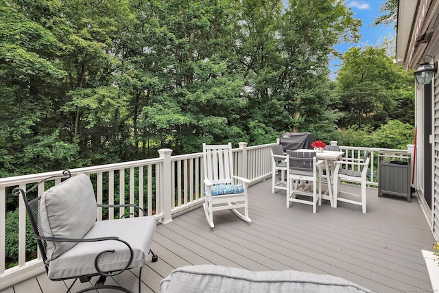 24 Windflower Ln, Shelton, CT 06484 - wooden terrace with outdoor dining space