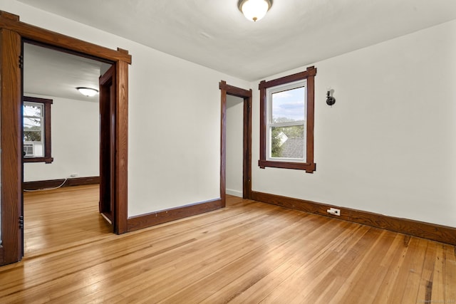 1276 N Ave, Stratford, CT 06614 - empty room with light wood finished floors