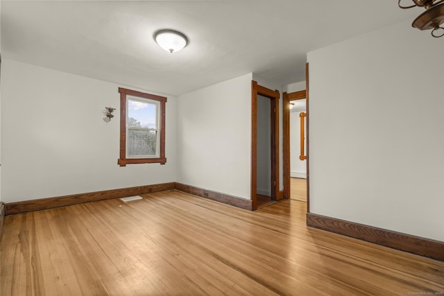 1276 N Ave, Stratford, CT 06614 - spare room featuring baseboards and light wood finished floors