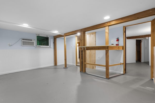 1276 N Ave, Stratford, CT 06614 - finished below grade area with a wall mounted air conditioner and recessed lighting