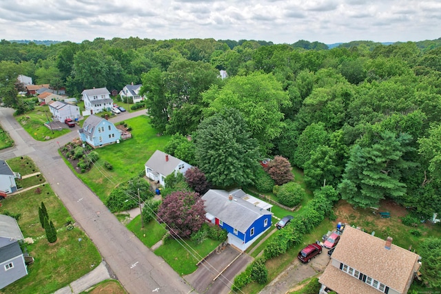 211 Pembroke Ave, Waterbury, CT 06704 - aerial perspective of suburban area with a heavily wooded area