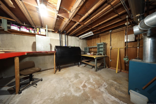 211 Pembroke Ave, Waterbury, CT 06704 - unfinished below grade area featuring heating fuel and a workshop area