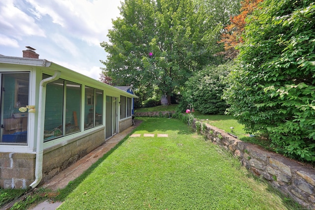 211 Pembroke Ave, Waterbury, CT 06704 - view of grassy yard with a sunroom