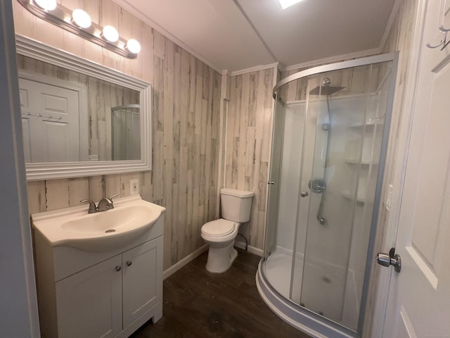 855 Thompsonville Rd, Suffield, CT 06078 - bathroom featuring a stall shower, vanity, wood finished floors, and wooden walls