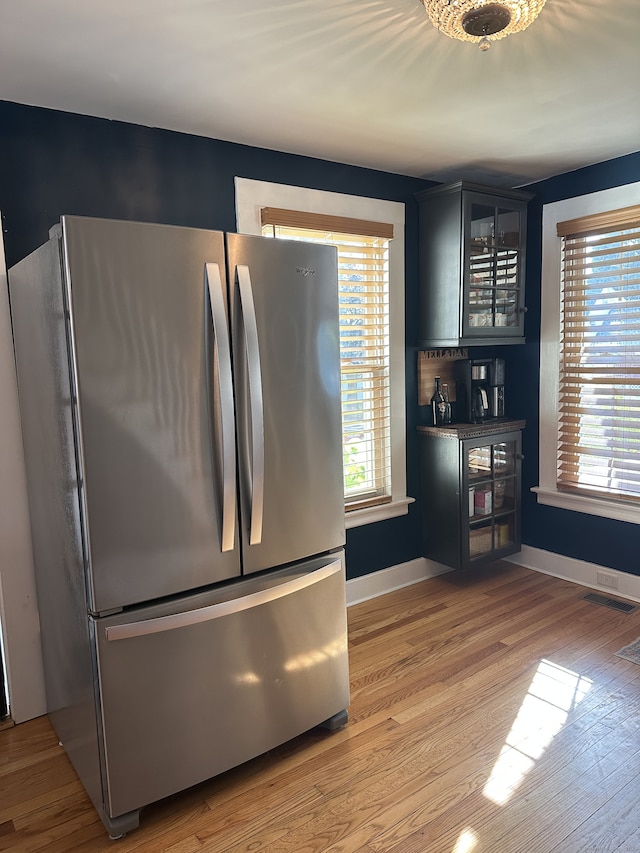6 Fairview Ave, Wallingford, CT 06492 - kitchen featuring freestanding refrigerator, plenty of natural light, and light wood-type flooring