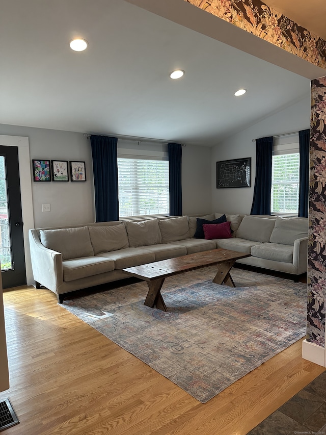 6 Fairview Ave, Wallingford, CT 06492 - living area with vaulted ceiling, wood finished floors, and recessed lighting