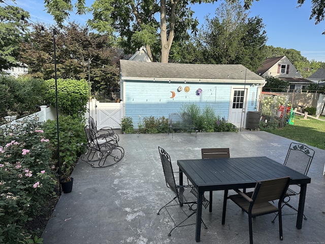6 Fairview Ave, Wallingford, CT 06492 - view of patio featuring outdoor dining space and a gate