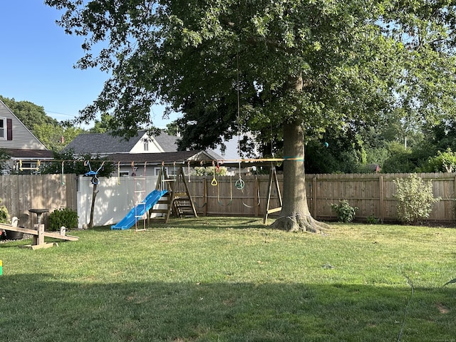 6 Fairview Ave, Wallingford, CT 06492 - fenced backyard with a playground