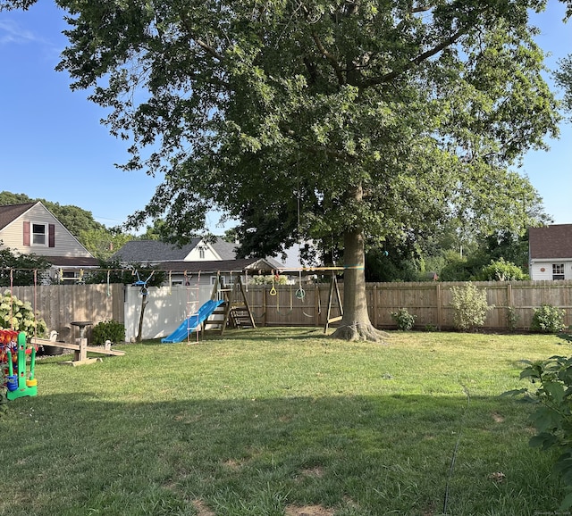 6 Fairview Ave, Wallingford, CT 06492 - fenced backyard with a playground