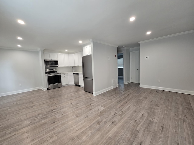 112 Glenwood Ave Unit 112, Bridgeport, CT 06610 - unfurnished living room with recessed lighting, crown molding, and light wood finished floors