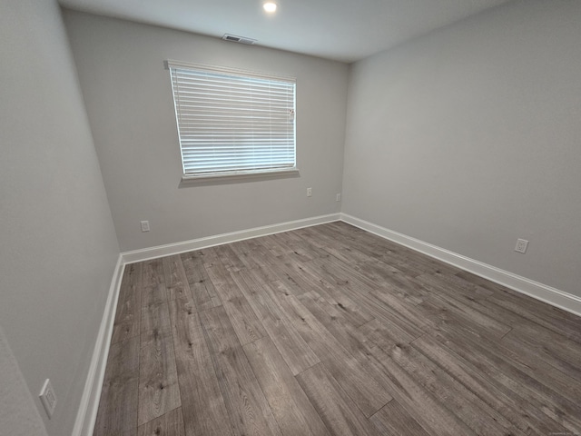 112 Glenwood Ave Unit 112, Bridgeport, CT 06610 - empty room featuring wood finished floors and baseboards