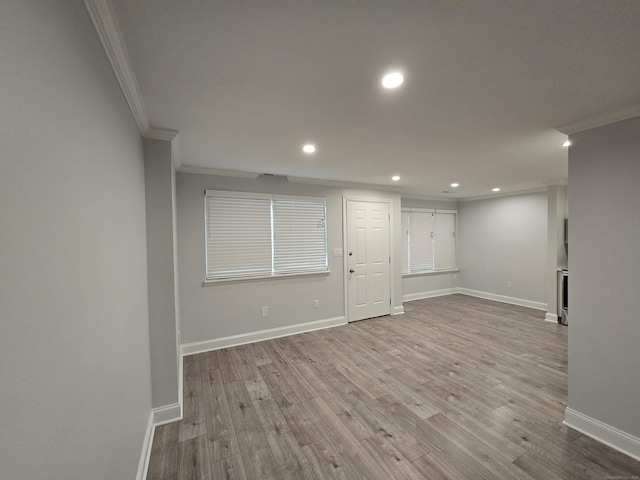 112 Glenwood Ave Unit 112, Bridgeport, CT 06610 - basement featuring ornamental molding, recessed lighting, and wood finished floors