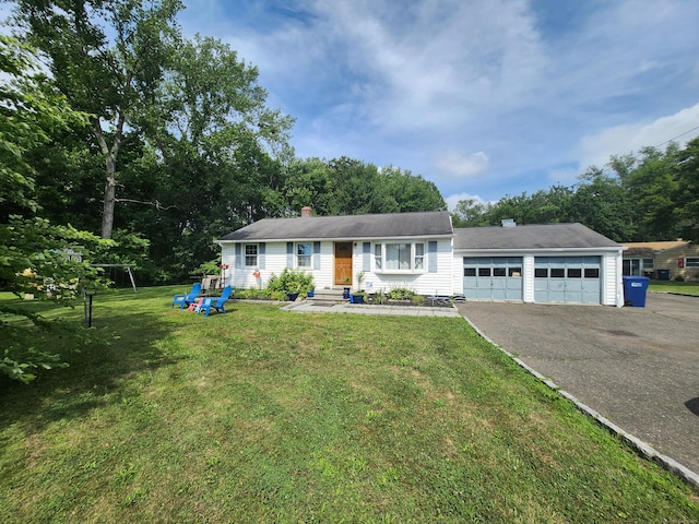 5 Cascio Rd, Ansonia, CT 06401 - ranch-style home with driveway, a chimney, a front yard, and a garage
