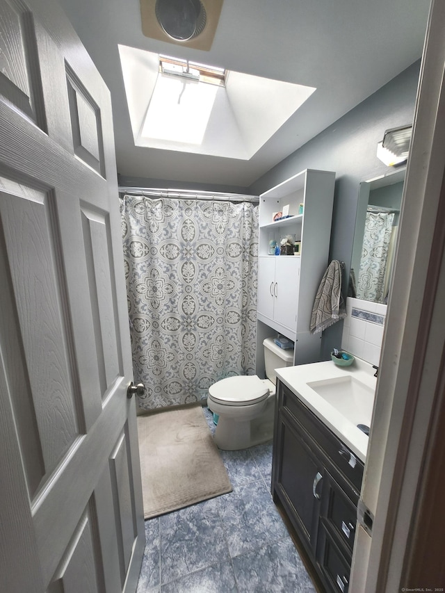 5 Cascio Rd, Ansonia, CT 06401 - bathroom with a skylight, vanity, and curtained shower