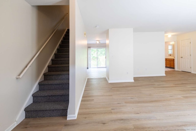 145 Manners Ave, Naugatuck, CT 06770 - staircase featuring wood finished floors and baseboards