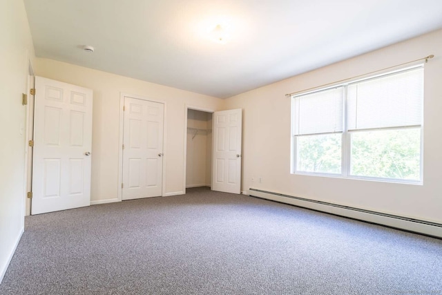 145 Manners Ave, Naugatuck, CT 06770 - unfurnished bedroom with a baseboard heating unit, carpet, and a closet