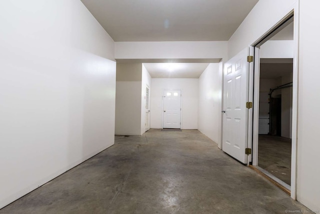 145 Manners Ave, Naugatuck, CT 06770 - hallway with unfinished concrete flooring