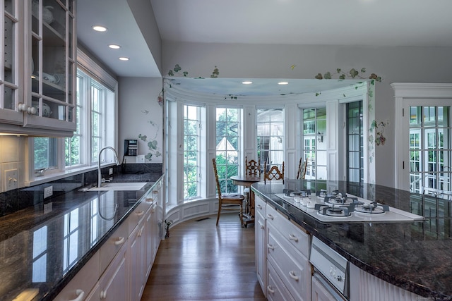 370 Northrop St, Bridgewater, CT 06752 - kitchen with white gas stovetop, recessed lighting, glass insert cabinets, dark wood finished floors, and dark stone counters