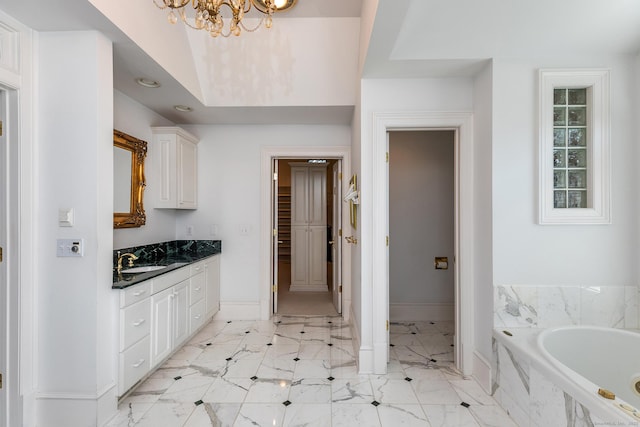 370 Northrop St, Bridgewater, CT 06752 - full bathroom with vanity, a bath, a chandelier, marble finish flooring, and recessed lighting