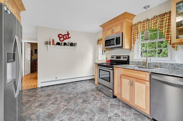 18 Nye St, Vernon, CT 06066 - kitchen featuring stainless steel appliances, light brown cabinetry, baseboard heating, light stone counters, and stone finish floors