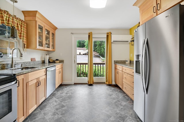 18 Nye St, Vernon, CT 06066 - kitchen with stainless steel appliances, light brown cabinetry, glass insert cabinets, and light stone countertops
